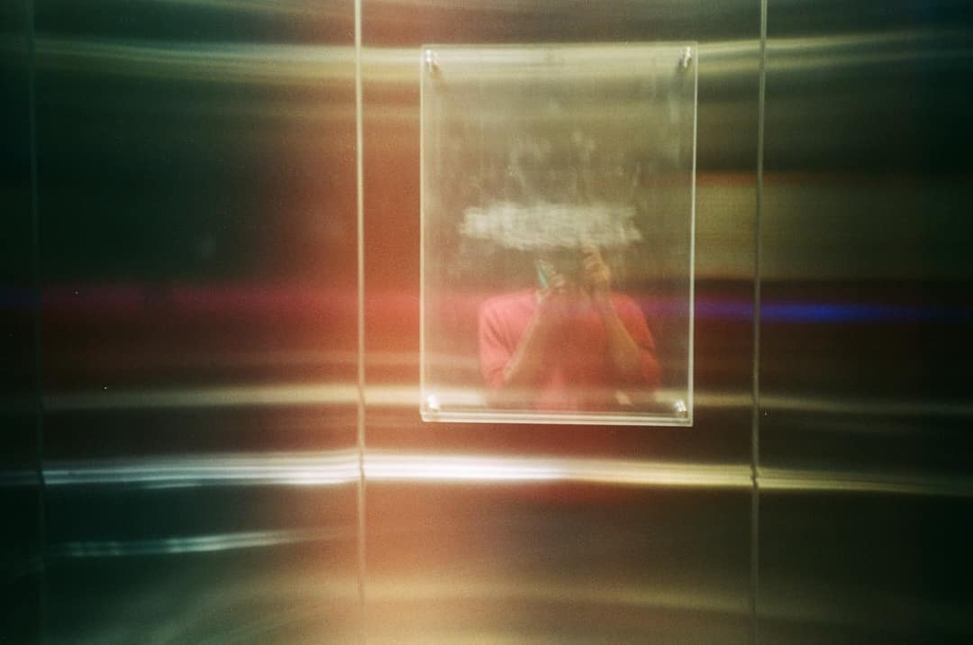Blurred Reflection in Elevator Mirror