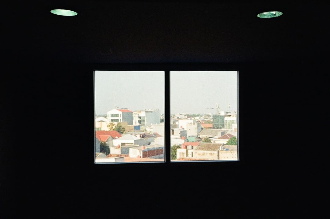 Cityscape Framed Through a Window. Shot with Olympus Mju II, Kodak Ultramax 400 film