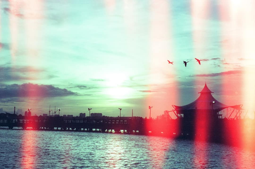 Sunset at Ancol Waterfront with Film Light Leaks