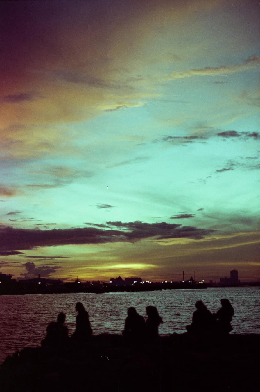 Sunset Silhouettes by the Sea